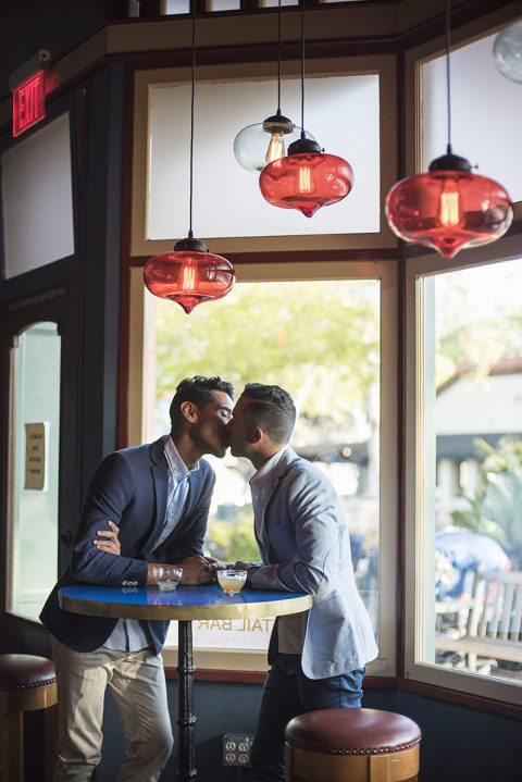 gay couple kissing in a Santa Barbara bar