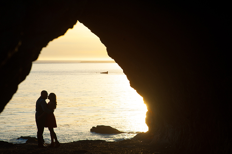 silhouette of couple at Pirate's Cove in Seal Beach California