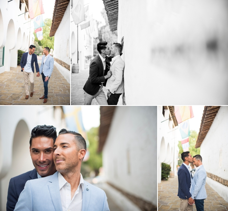 gay couple posing in Spanish hallway of cobblestone in Santa Barbara