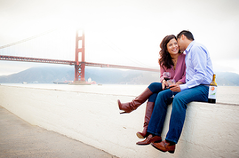 Filipino couple kissing in front of the Golden Gate Bride in San Francisco