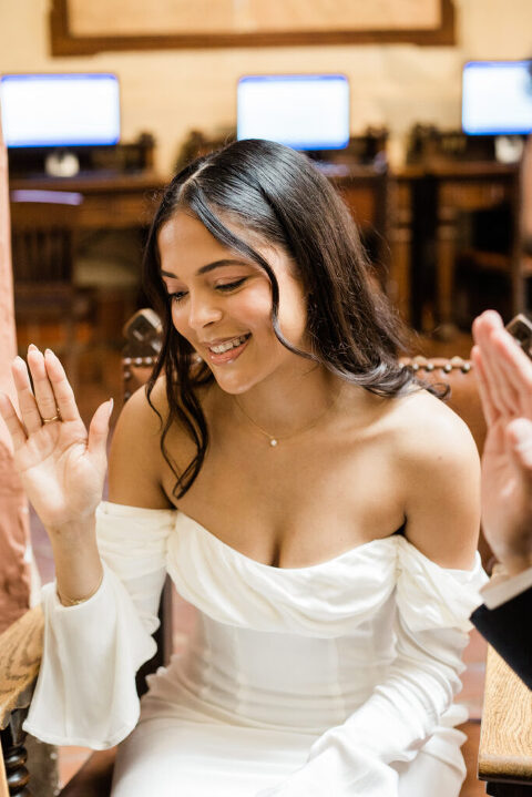 Bride taking wedding oath inside Santa Barbara Courthouse Hall of Records
