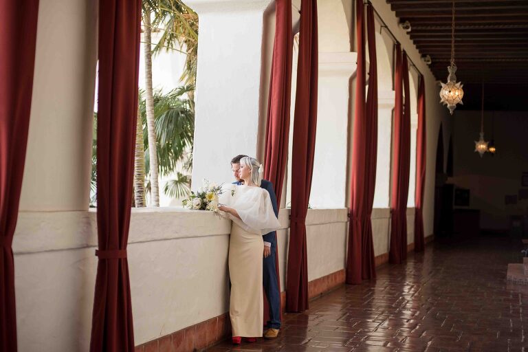 Asian bride and Caucasian groom married at the Santa Barbara Courthouse 2nd floor hallway