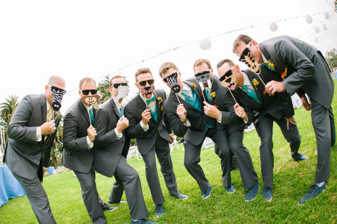 groomsmen posing with animal masks