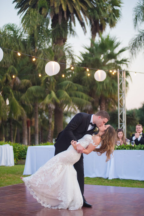 groom dipping bride at first dance at Santa Barbara zoo wedding