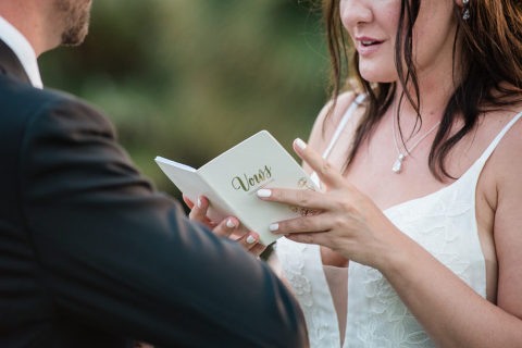 bride reading her vows at her Santa Barbara Zoo wedding