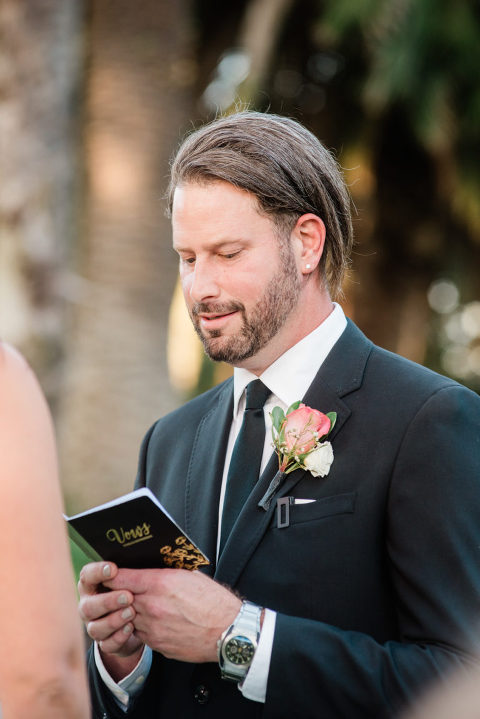 groom reading his vows at his Santa Barbara Zoo wedding