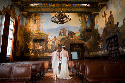two brides at their Santa Barbara courthouse wedding in the Mural Room