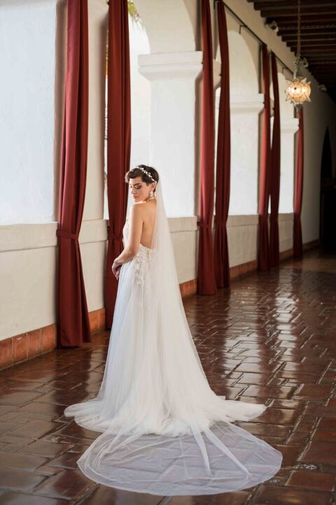 bride standing in hallway of santa barbara courthouse